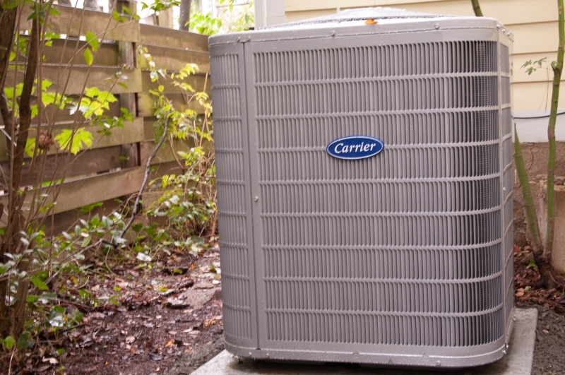 An outdoor residential Carrier air conditioning unit installed in Princeton, NJ